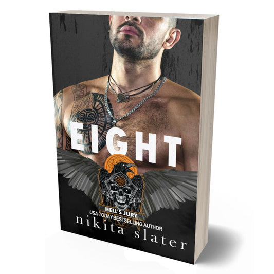 Book titled 'Eight' by Nikita Slater with a shirtless man with tattoos on the cover.